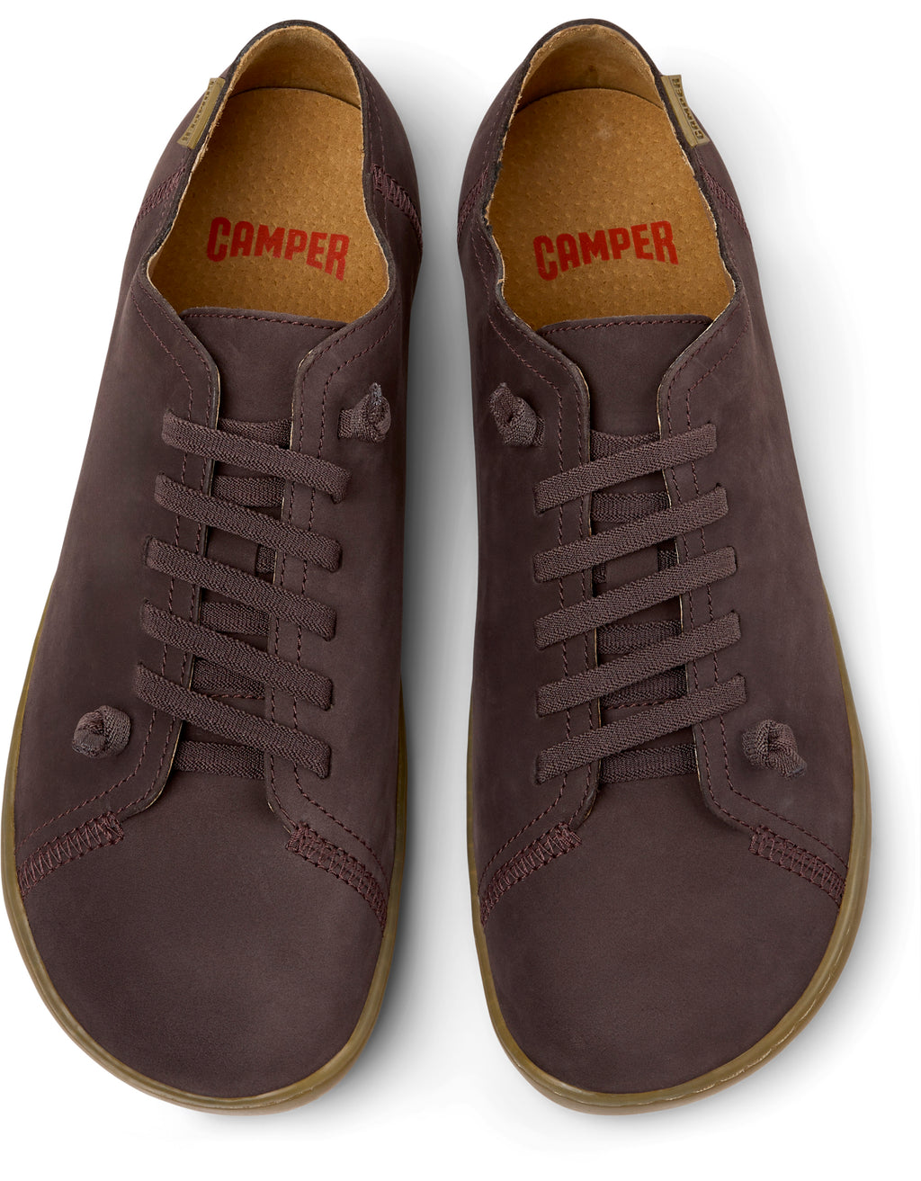 Pair of brown leather shoes with 'Camper' branding on a white background