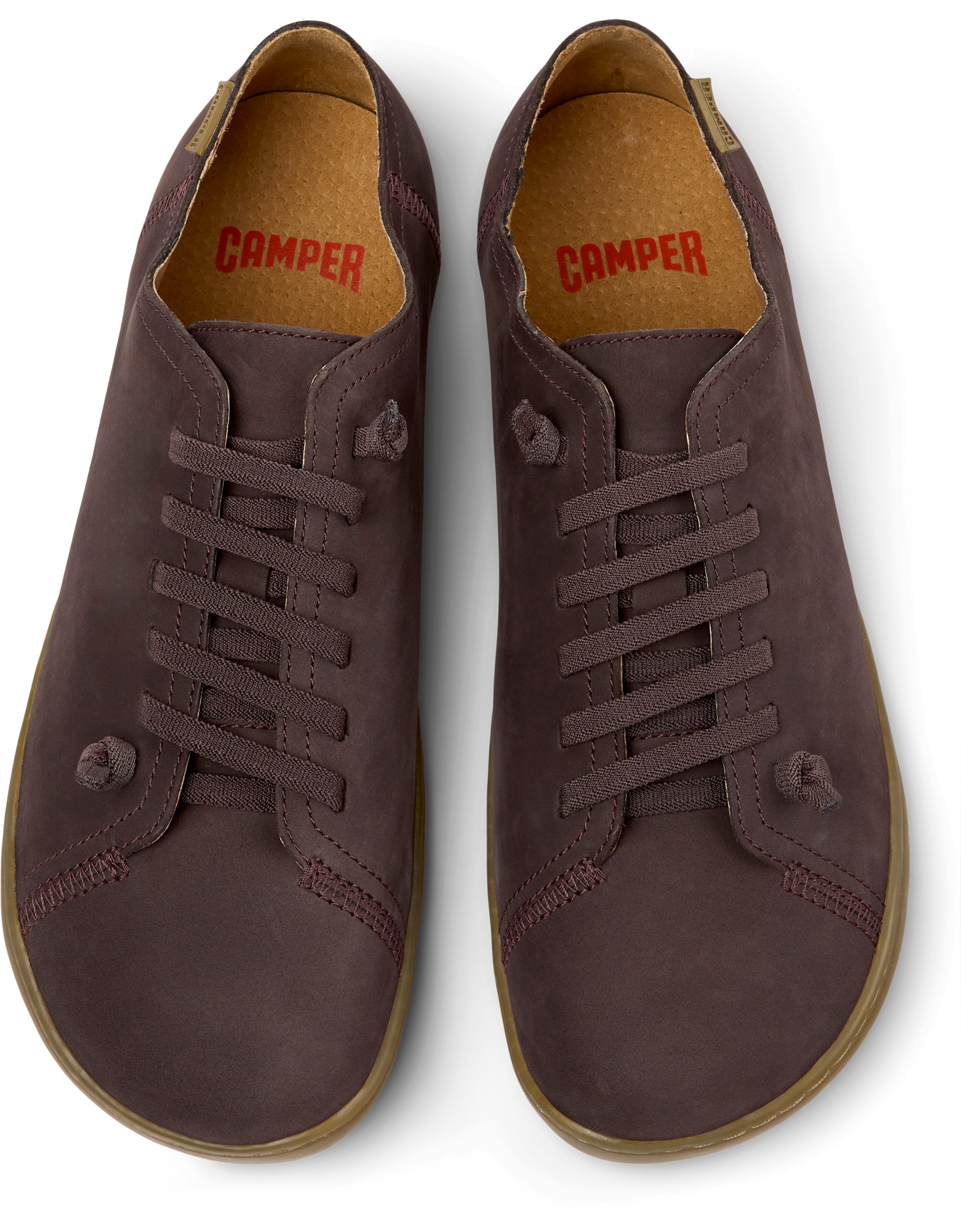 Pair of brown leather shoes with 'Camper' branding on a white background