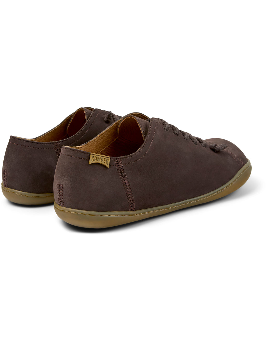 Pair of brown shoes on a white background