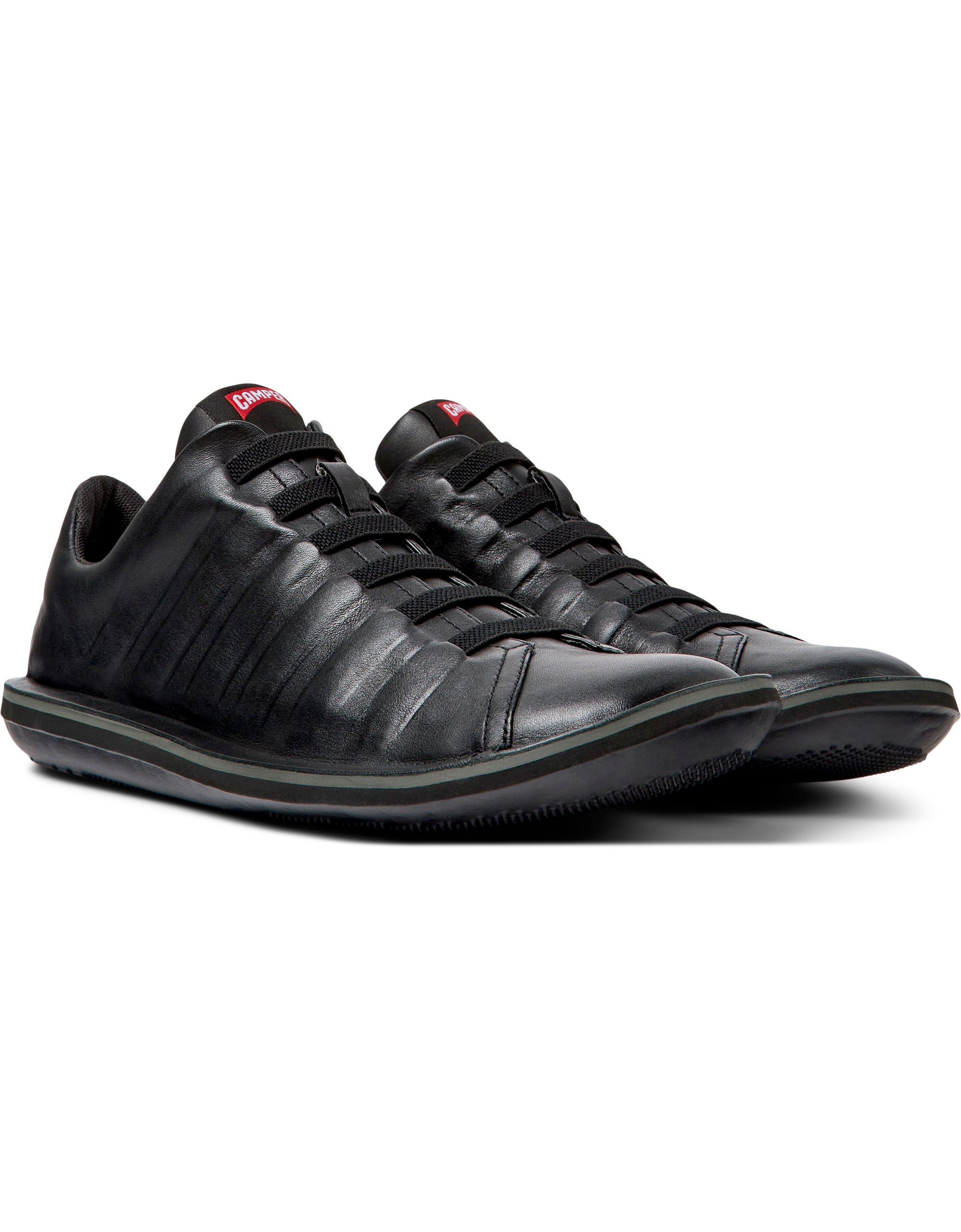 Black sneakers on a white background
