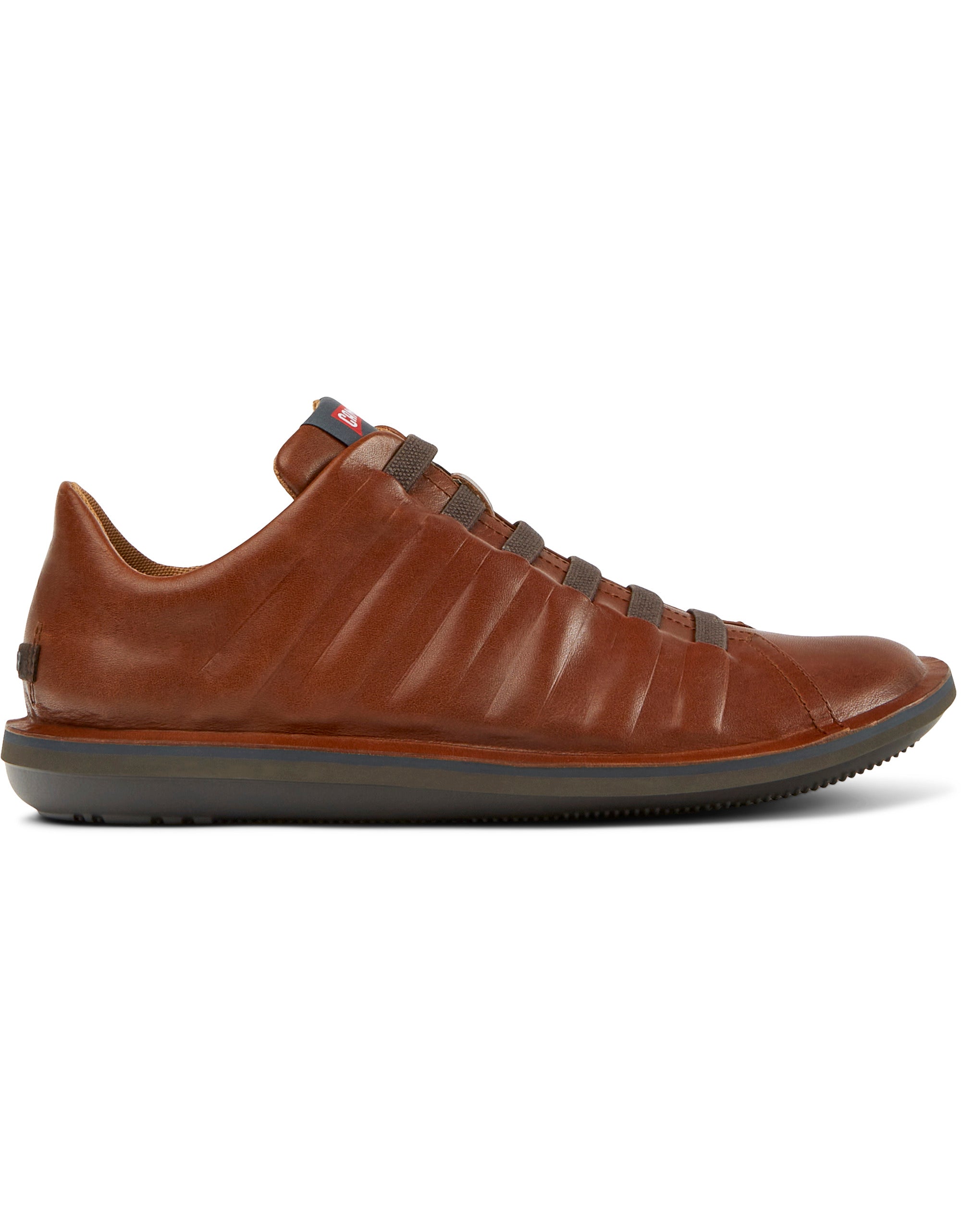 Brown leather shoe on a white background