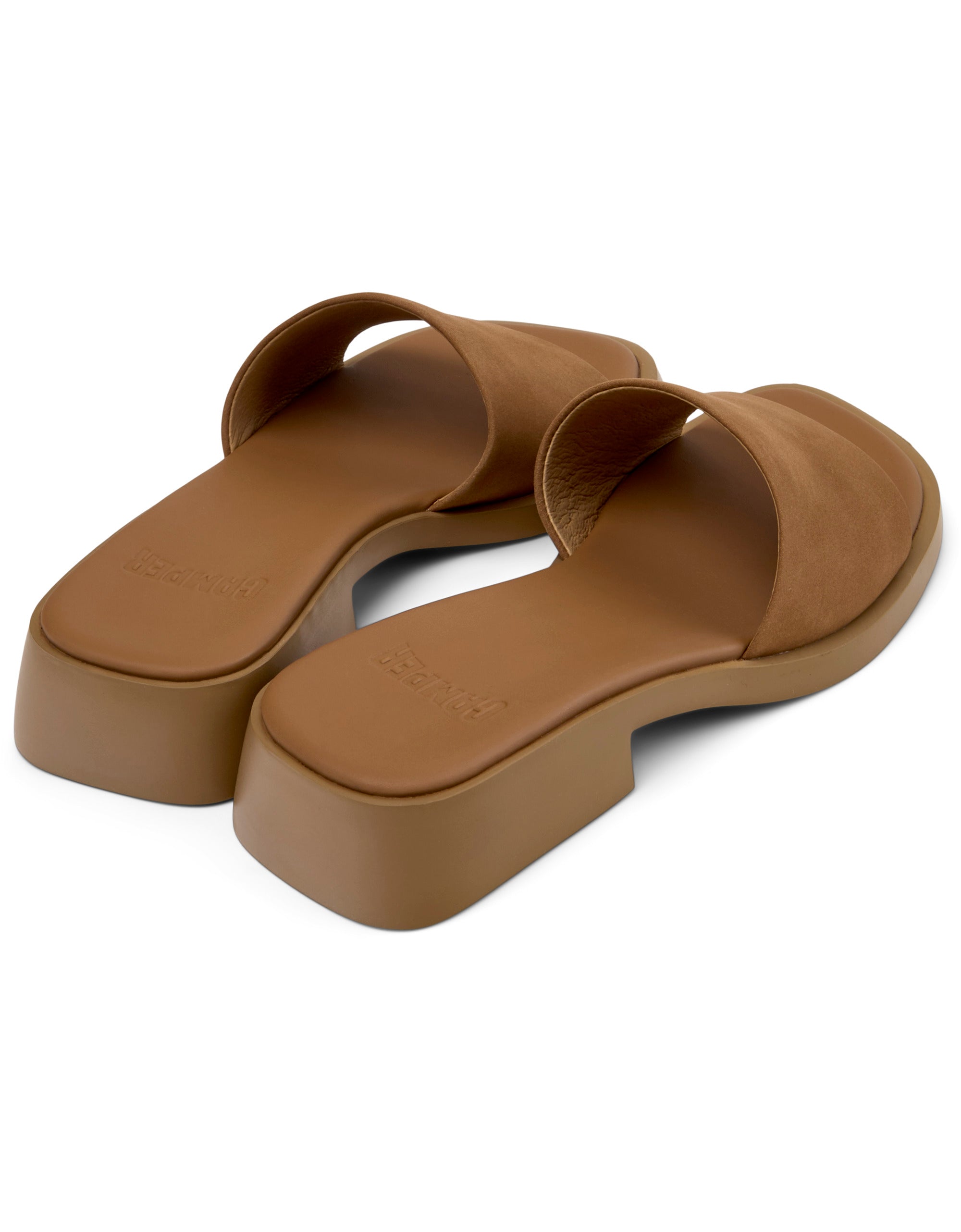 Pair of brown sandals on a white background
