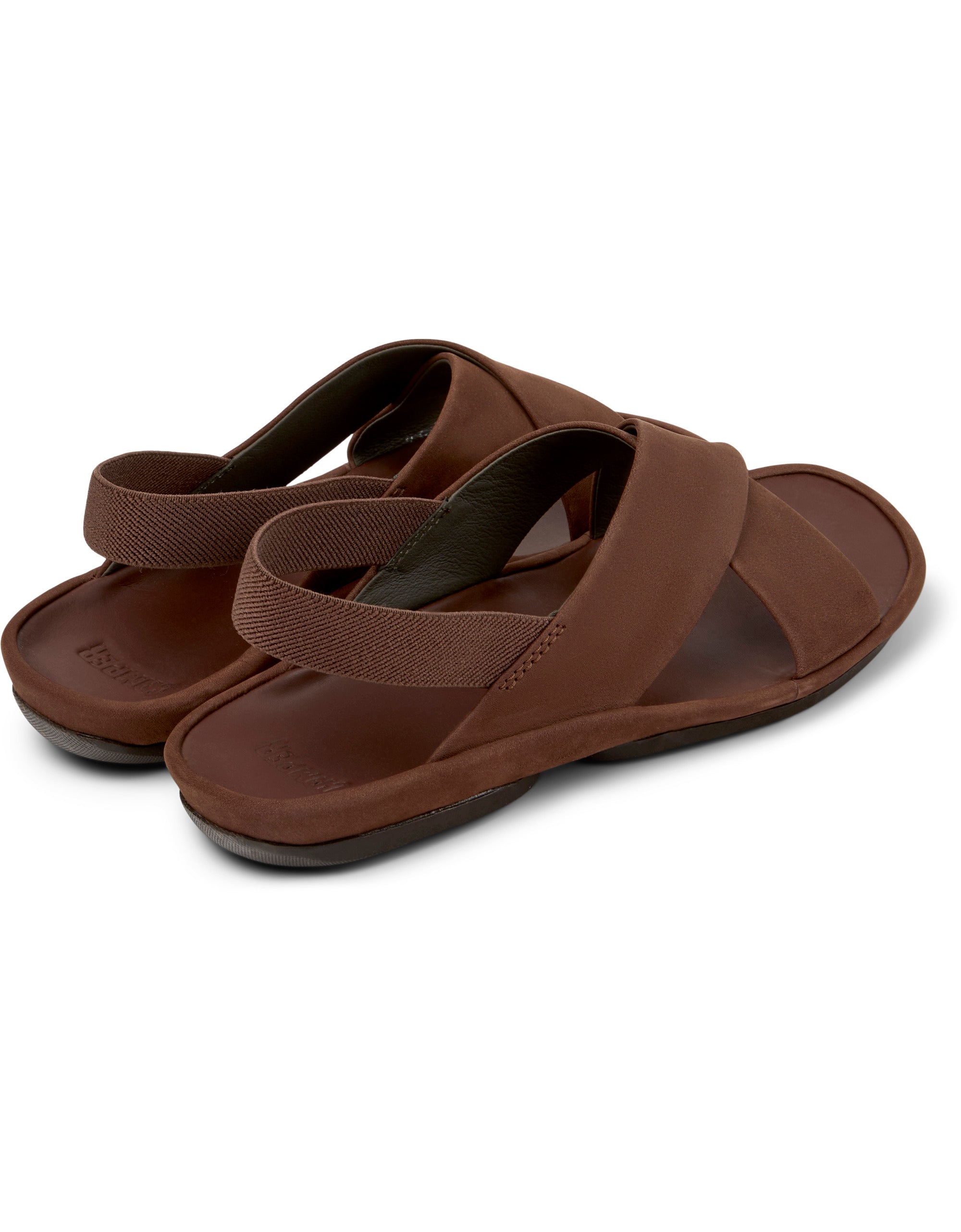 Pair of brown sandals on a white background