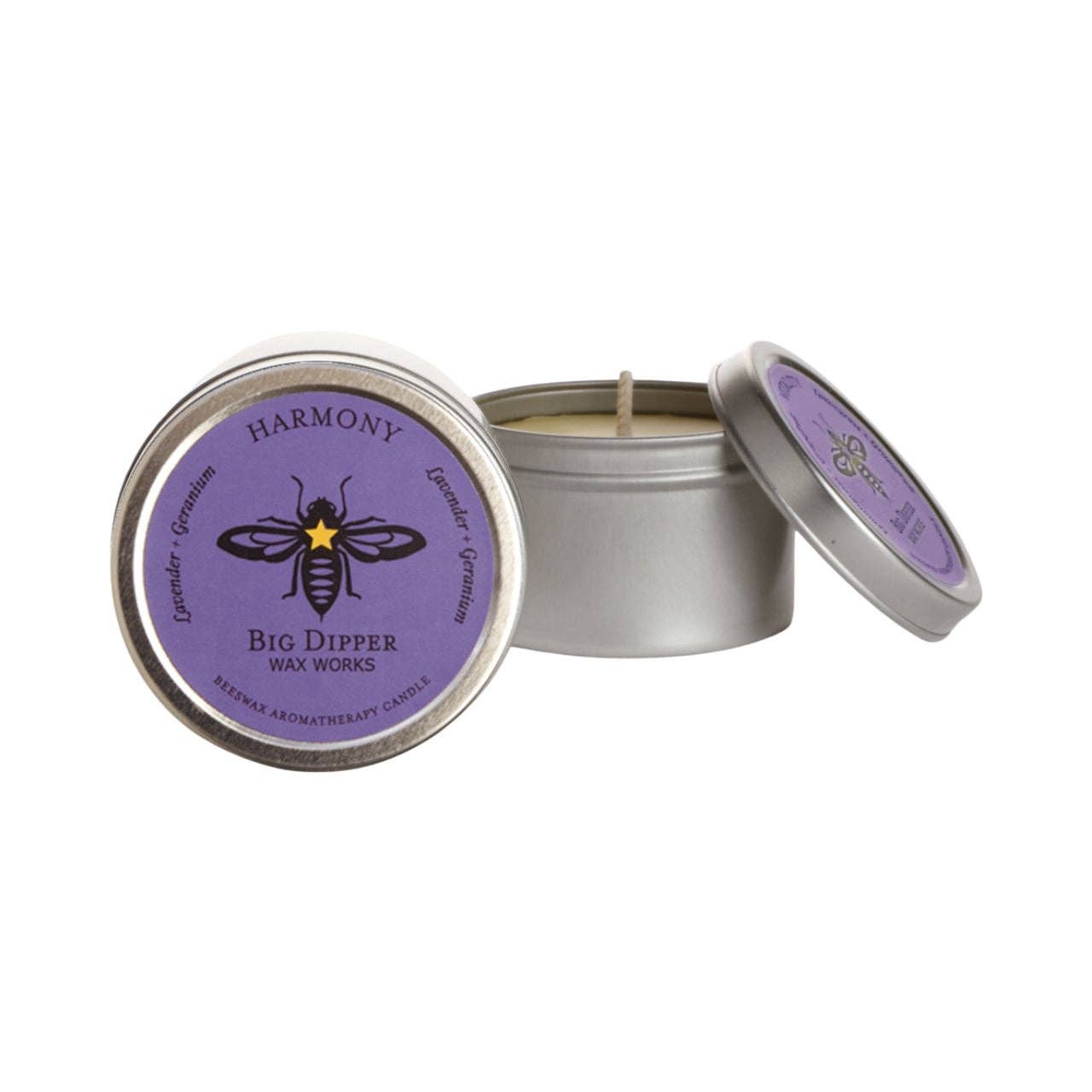 Harmony Candle in a metal tin with purple lid and visible brand logo on a white background