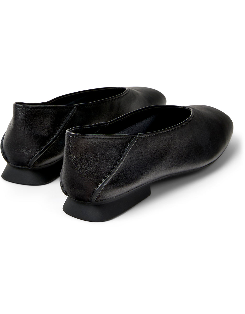 Pair of black leather shoes on a white background