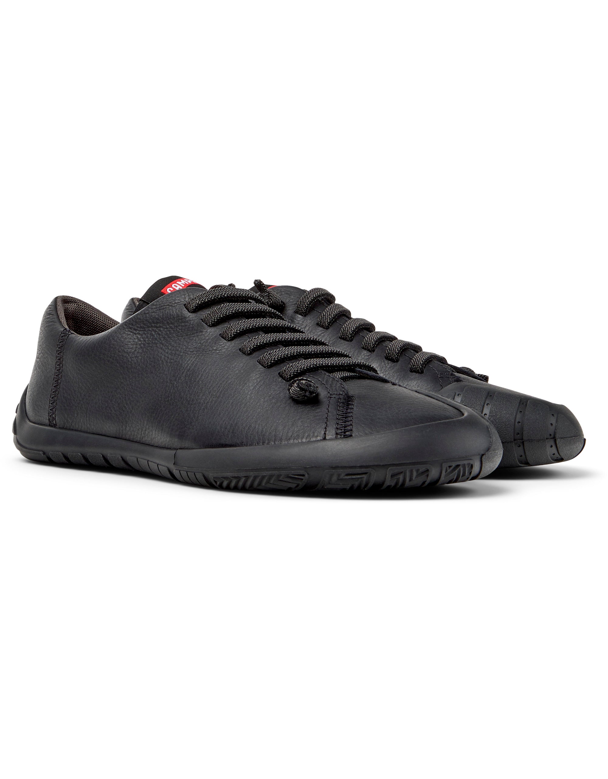 Black sneakers on a white background