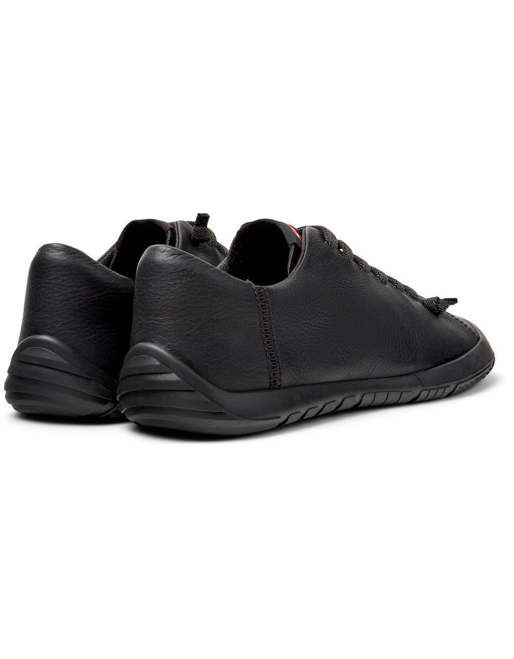 Black leather shoes on a white background