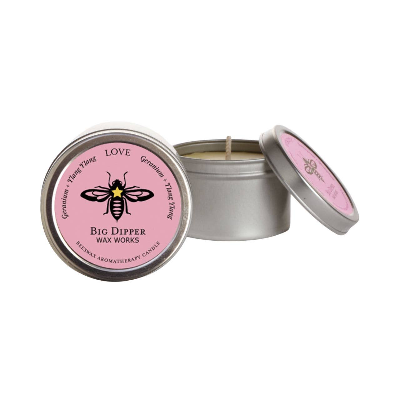 Love Candle in a metal tin with pink lid featuring a logo and text on a white background