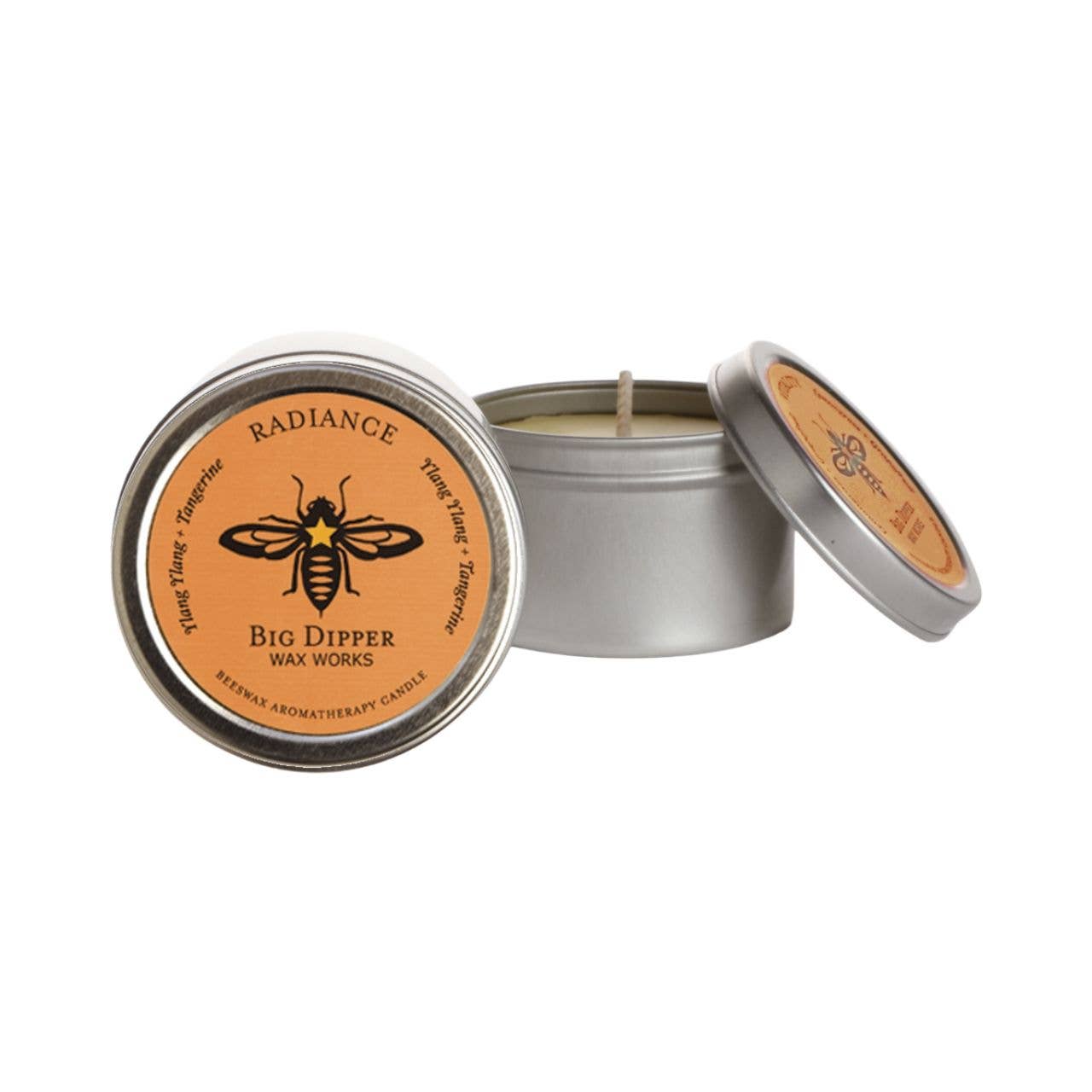 Radiance_Candle in a metal tin with a label featuring a bee design on a white background