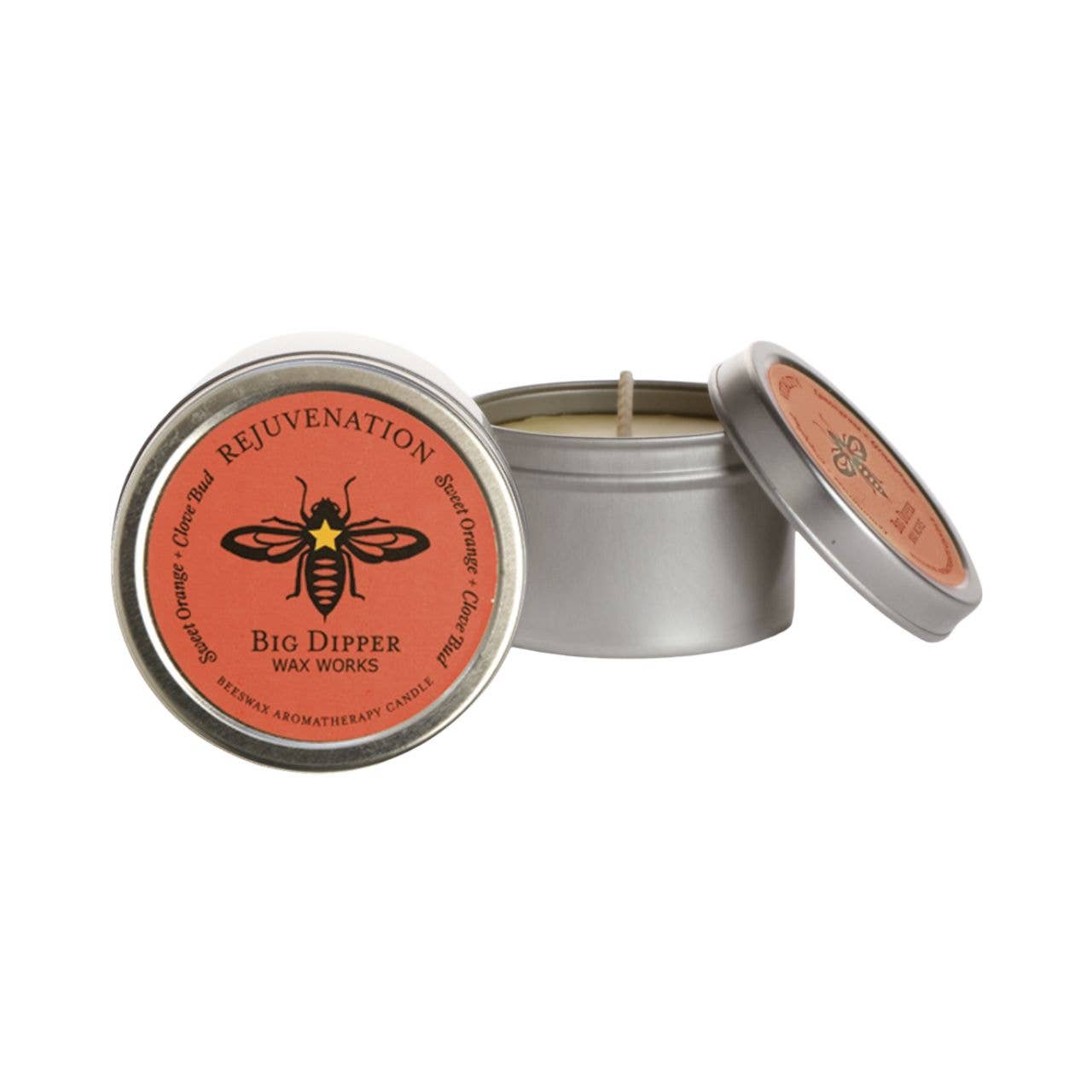 Rejuvenation Candle in a metal tin with a red label featuring a bee design, on a white background.