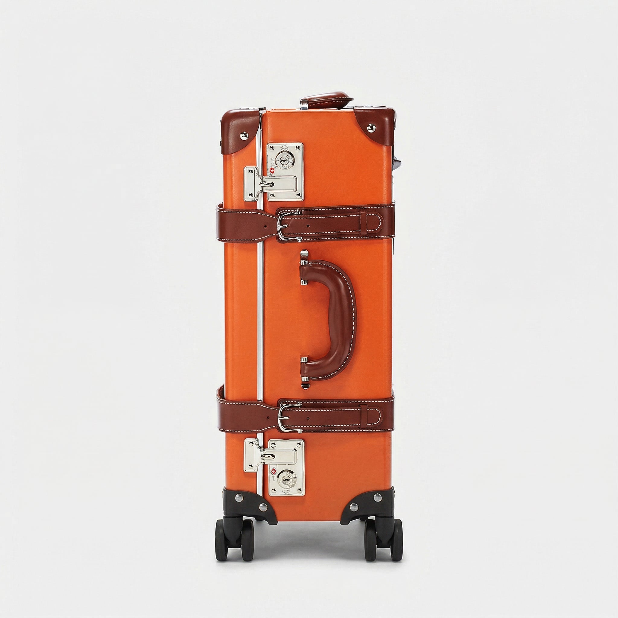 Orange suitcase with brown accents on a light gray background