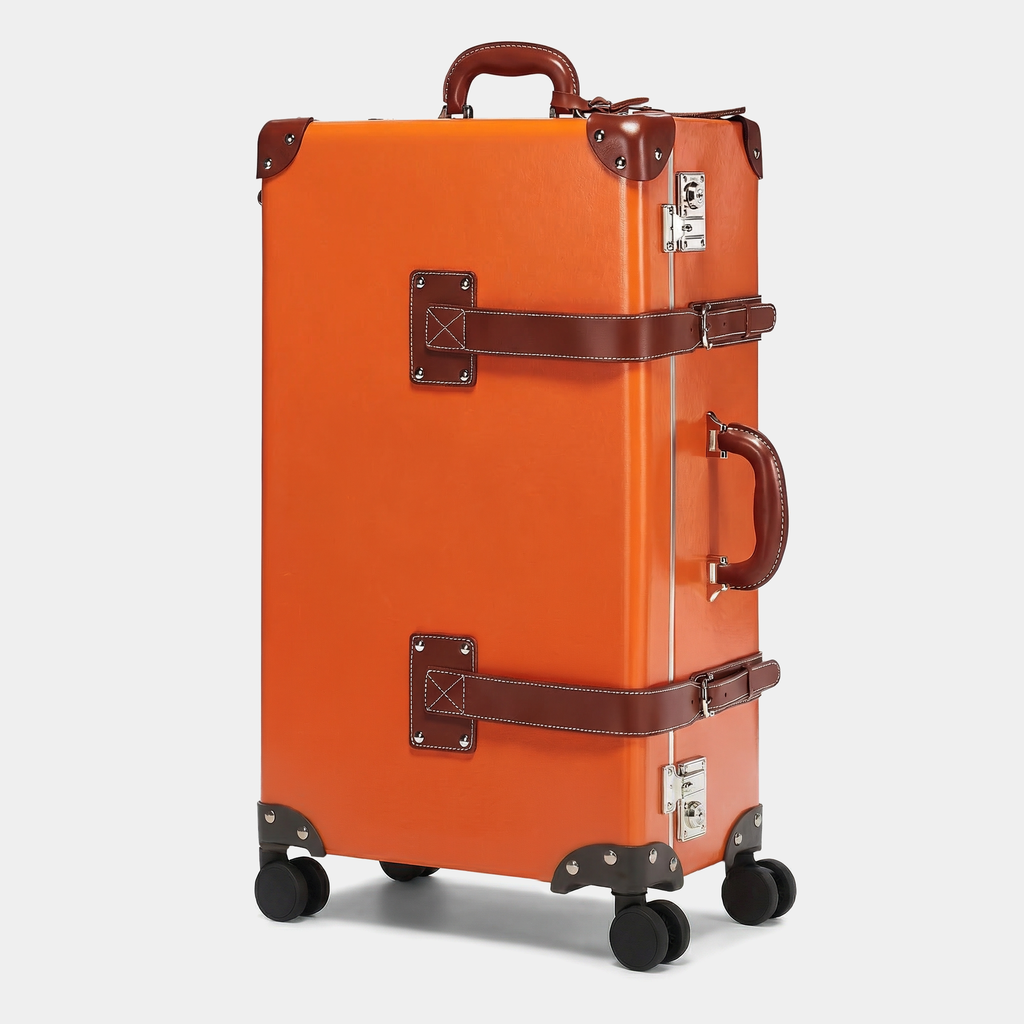 Orange suitcase with brown accents on a white background