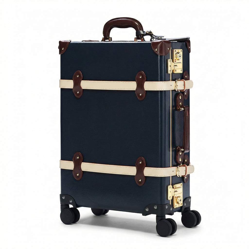 Navy suitcase with brown accents on a white background