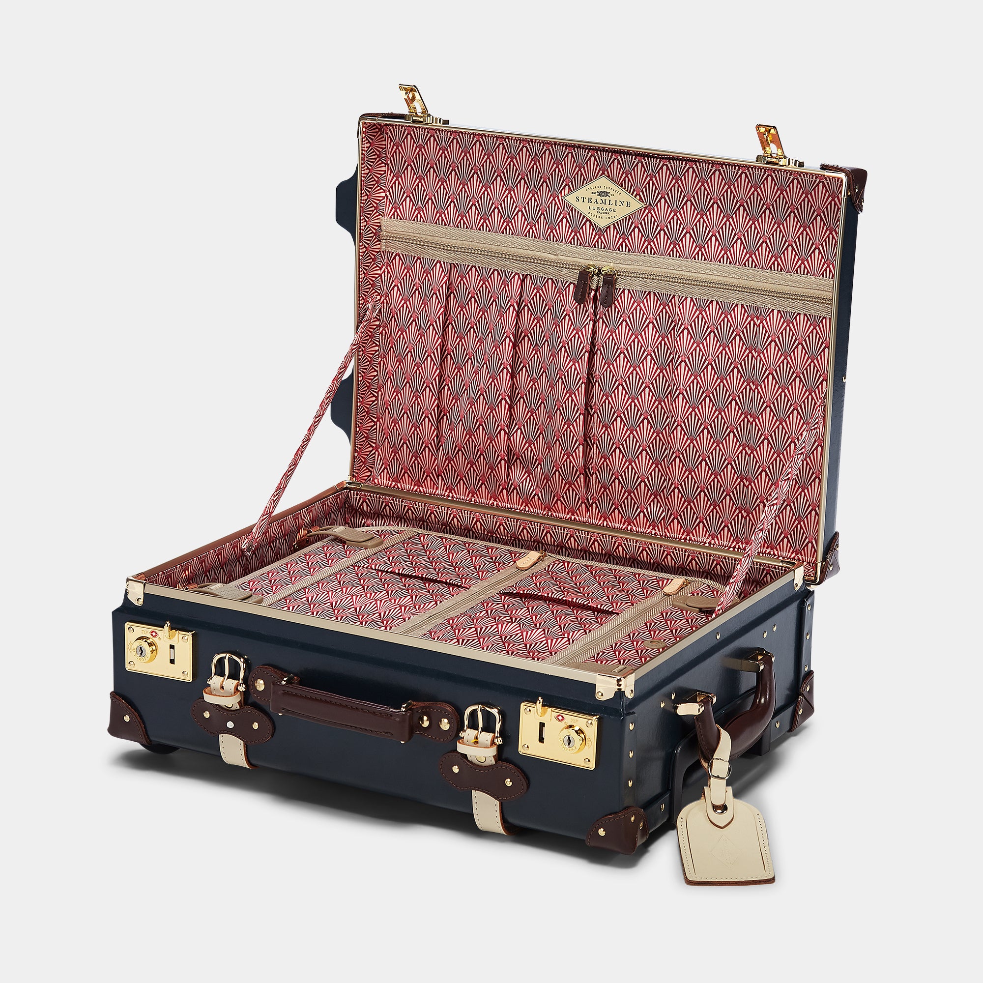 Open suitcase with red interior pattern on a light gray background