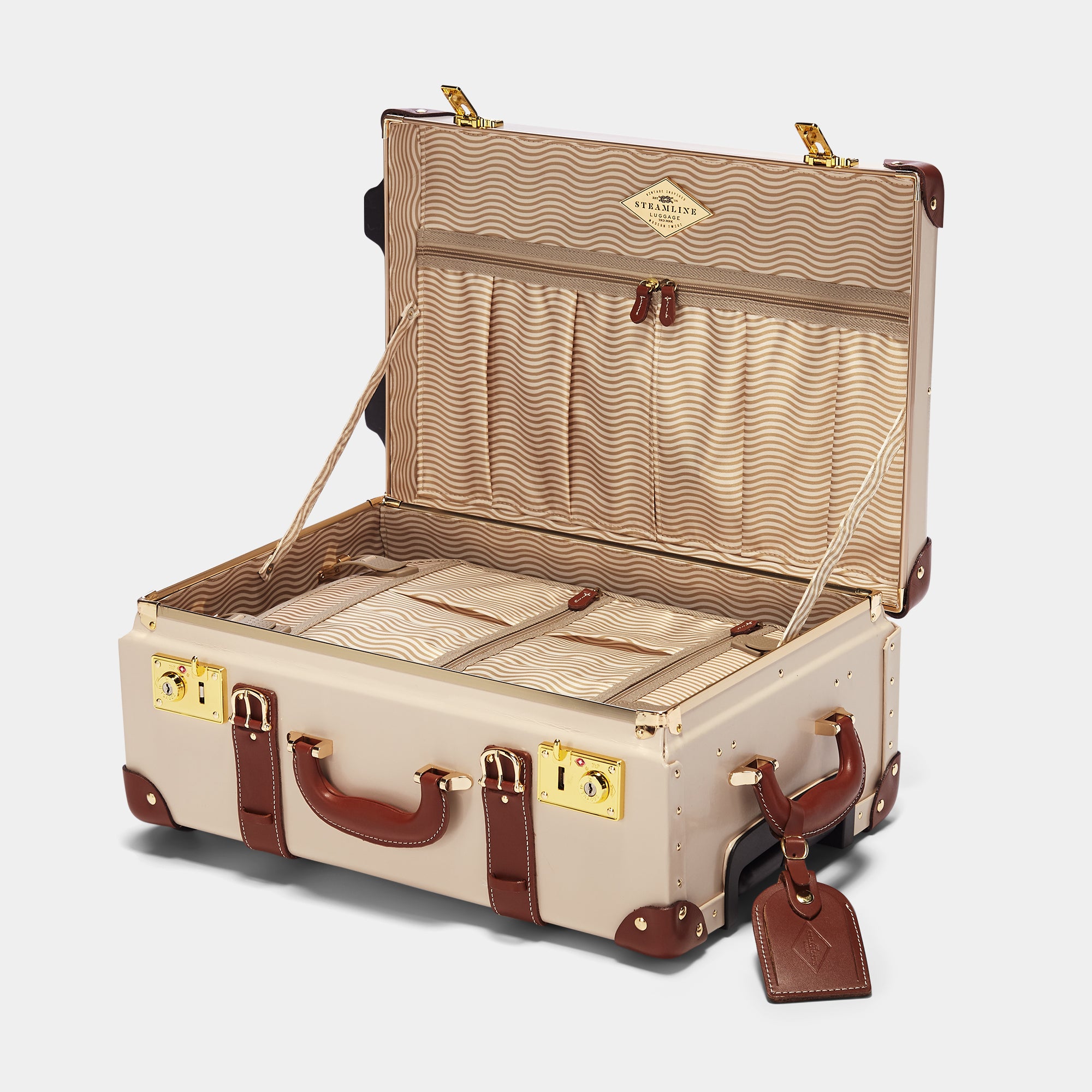 Beige suitcase with open lid on a white background