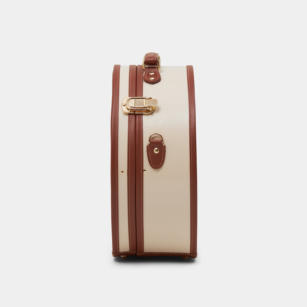 Vintage-style hatbox with brown and beige design on a white background