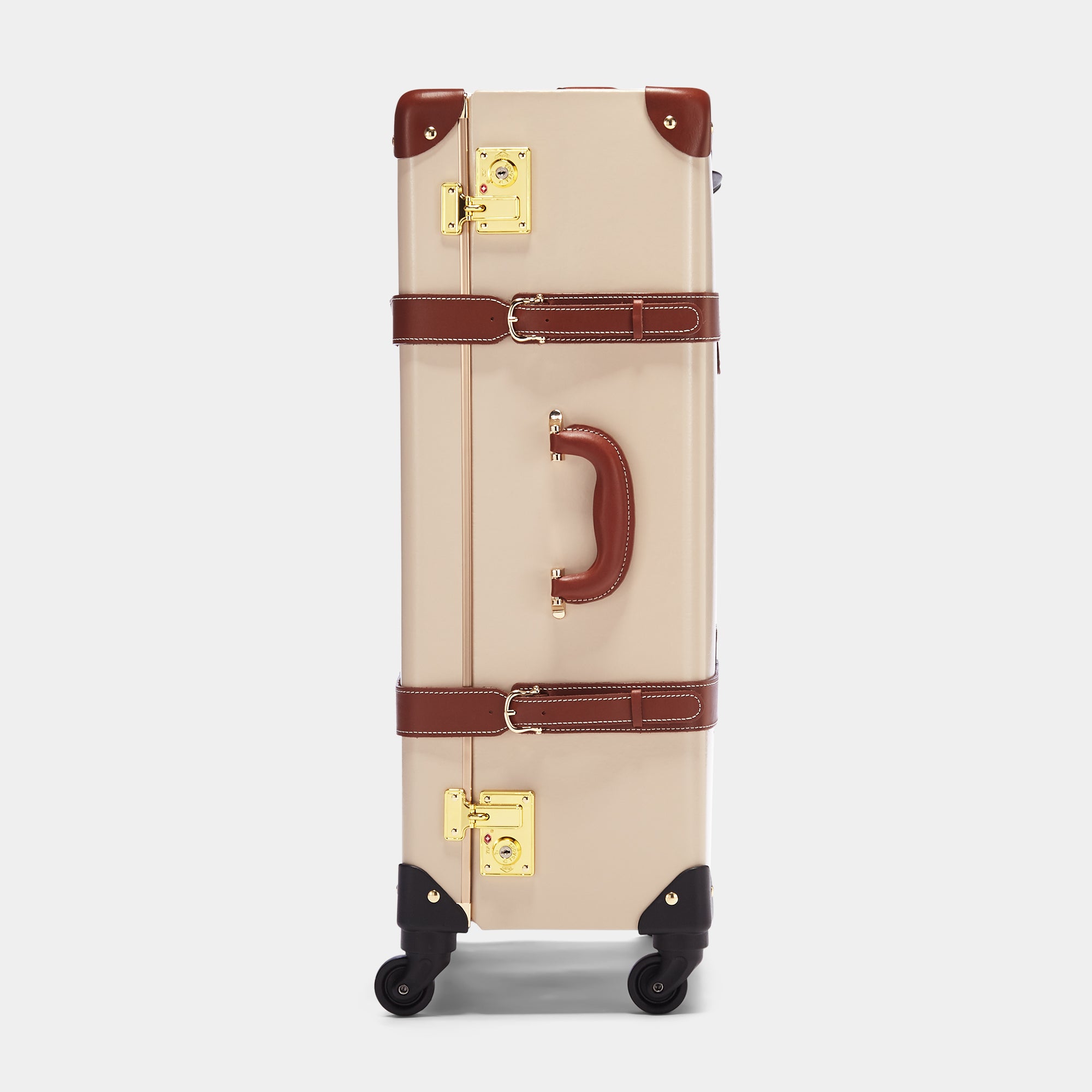 Beige suitcase with brown accents on a white background