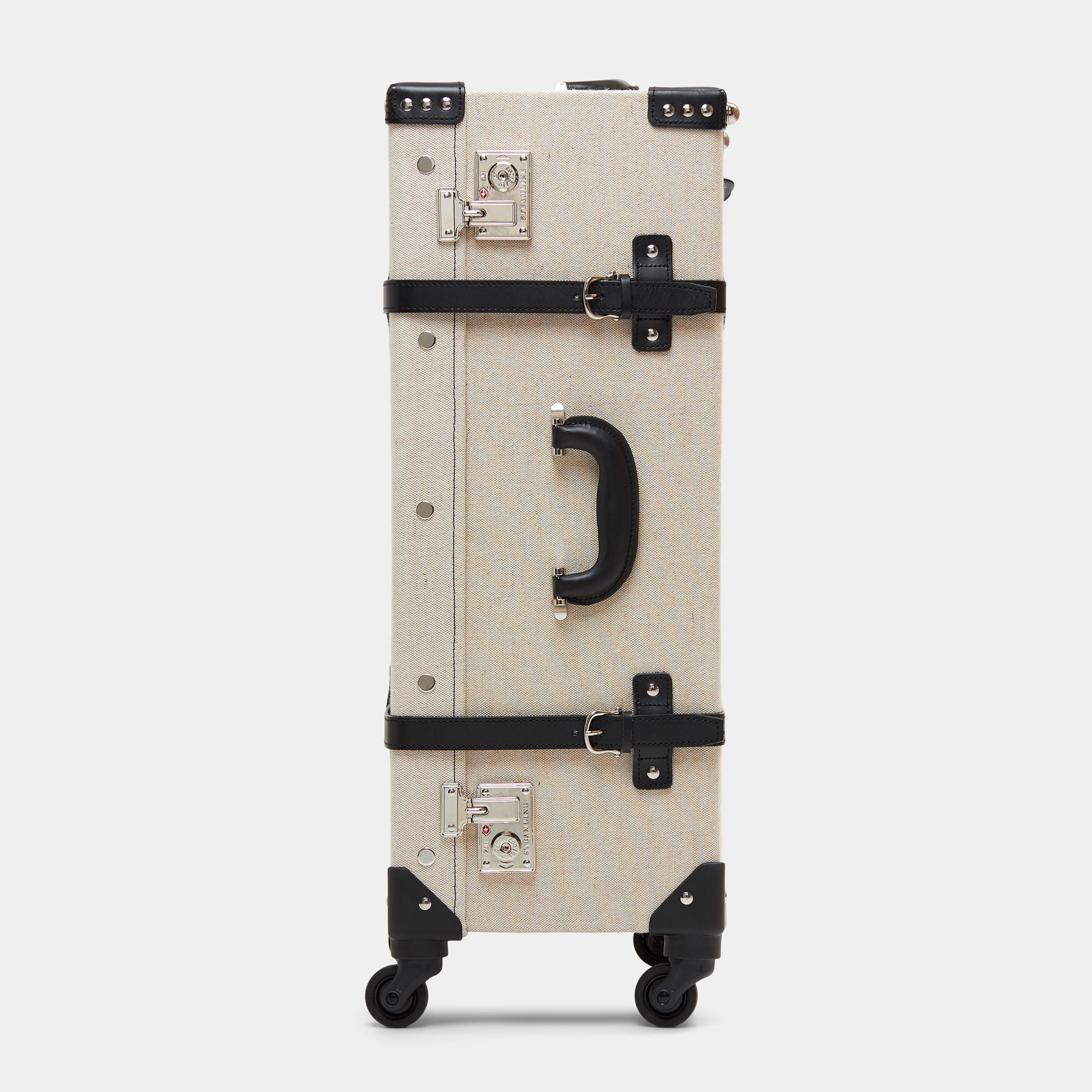 Beige suitcase with black accents on a white background