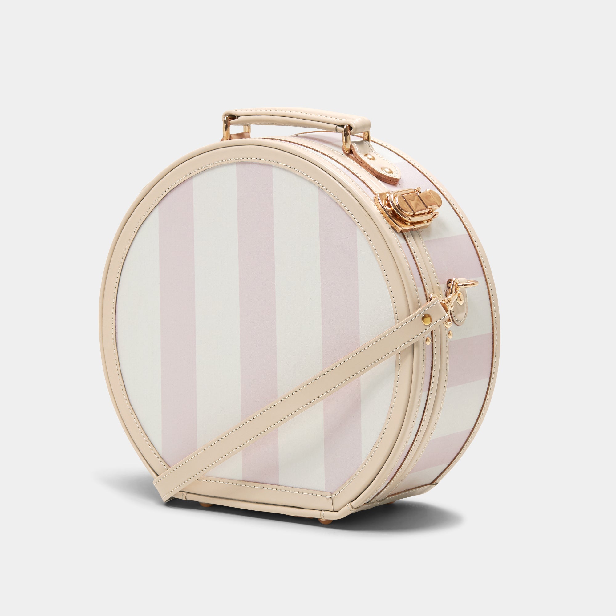 Heart-shaped makeup case with striped design on a white background