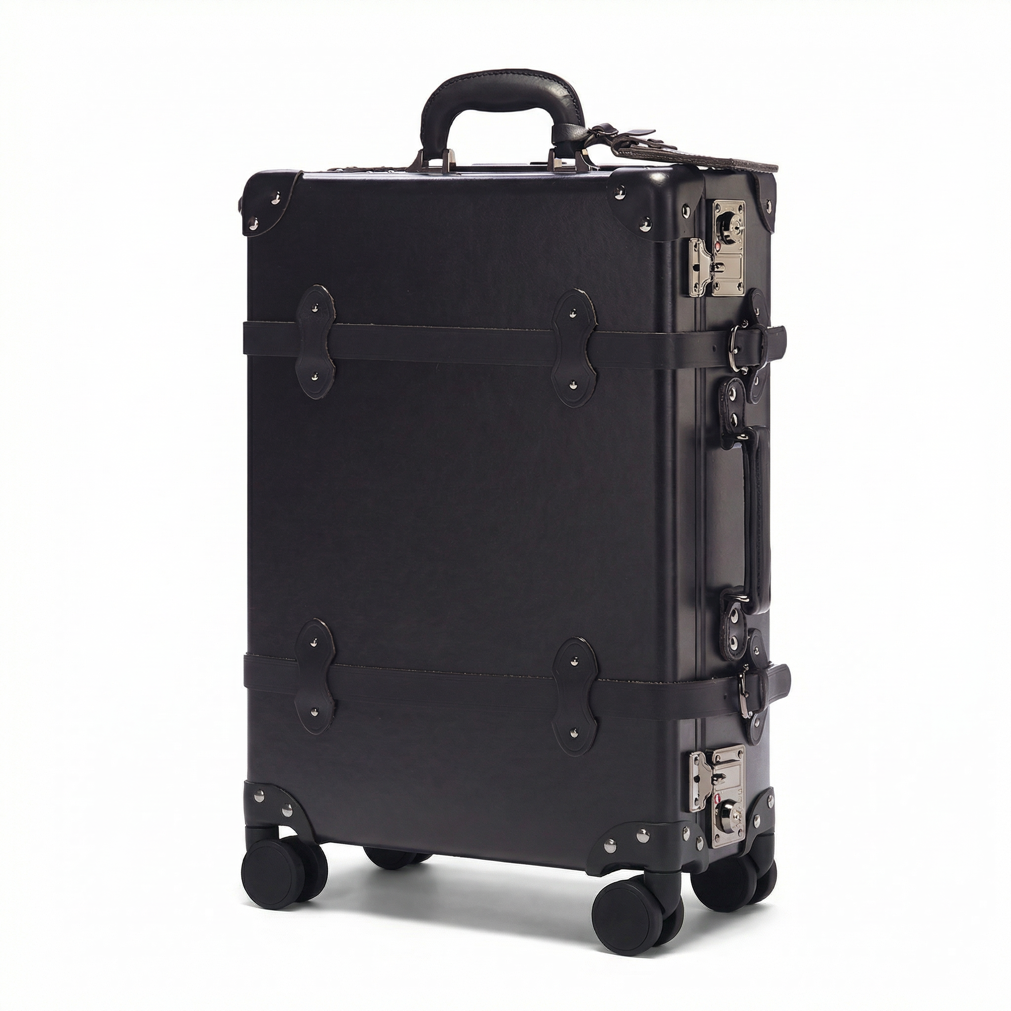 Black suitcase with metallic accents on a white background