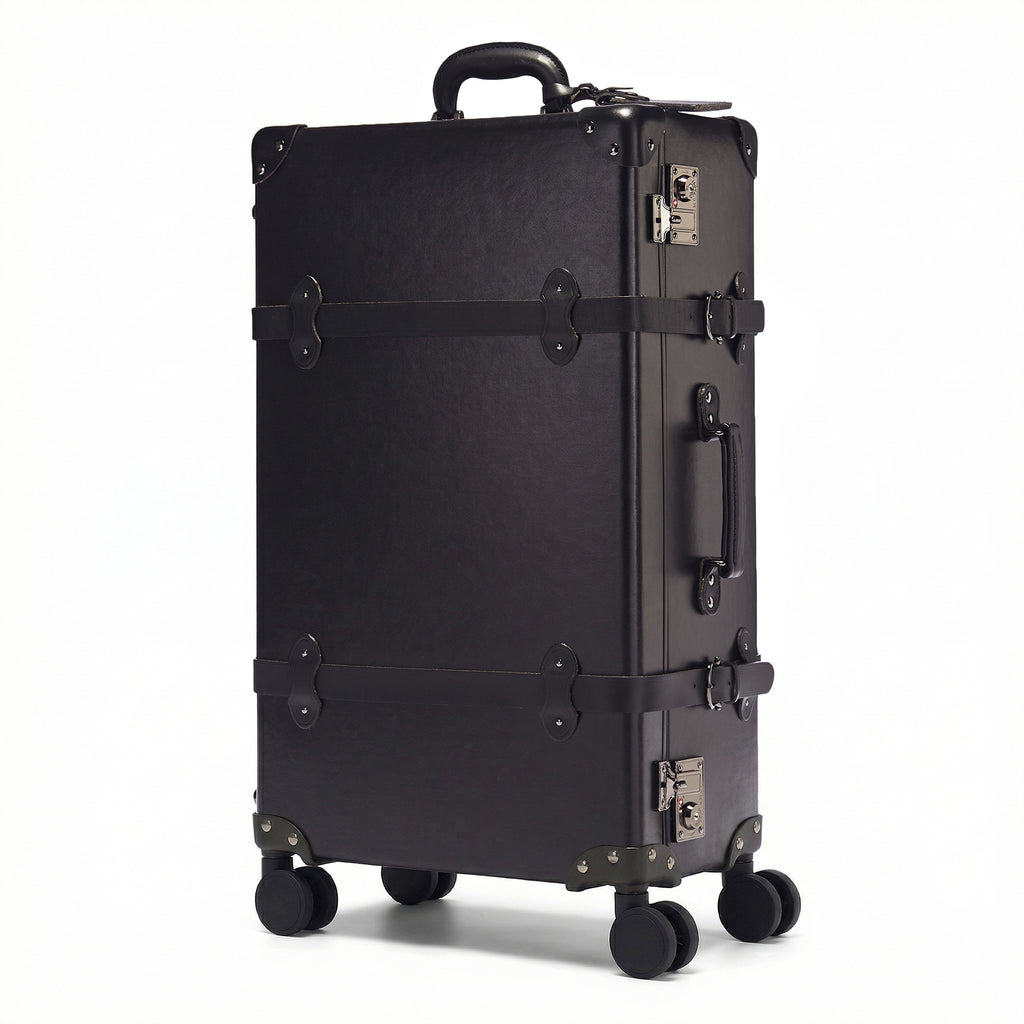 Black suitcase with wheels on a white background
