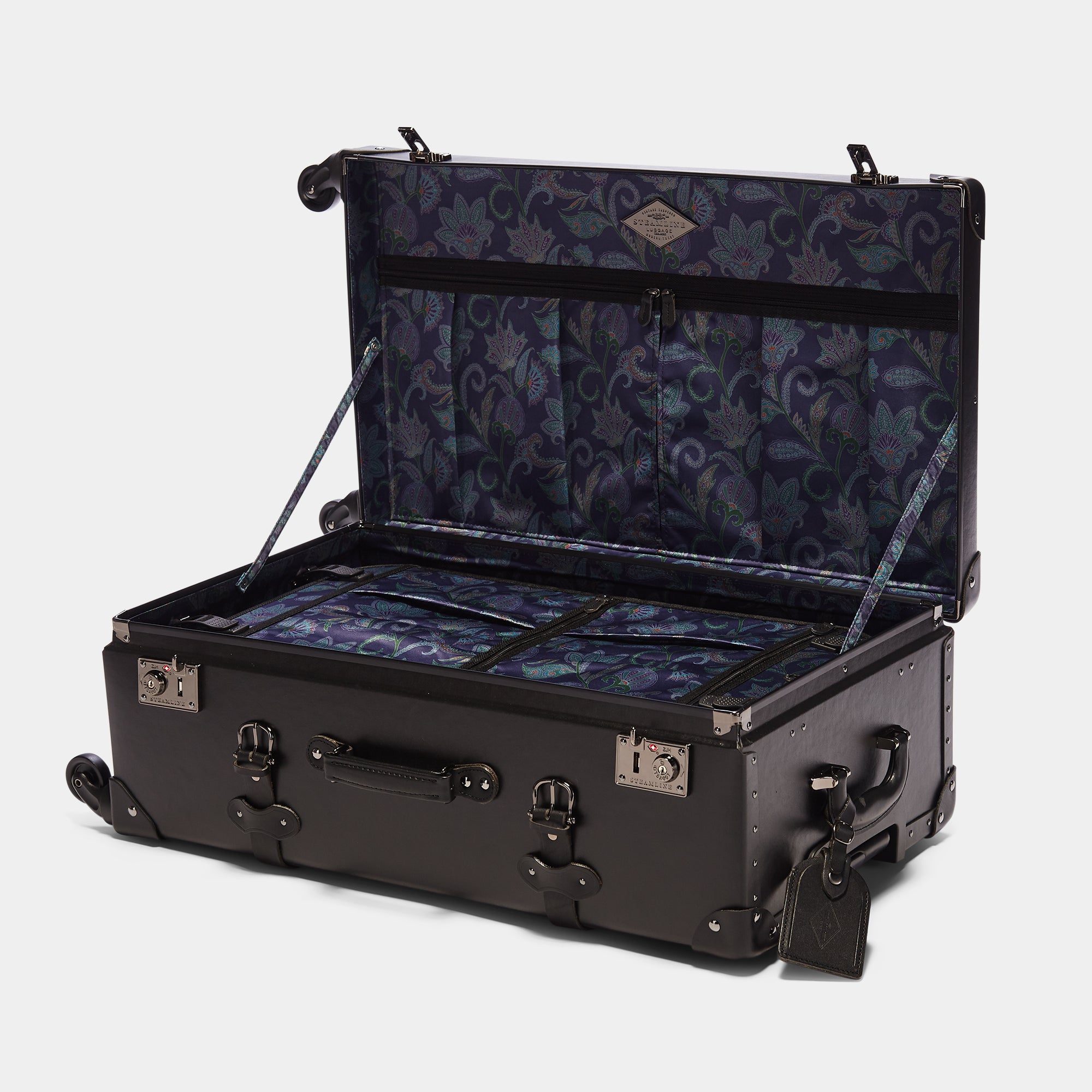 Open black suitcase with floral interior on a white background