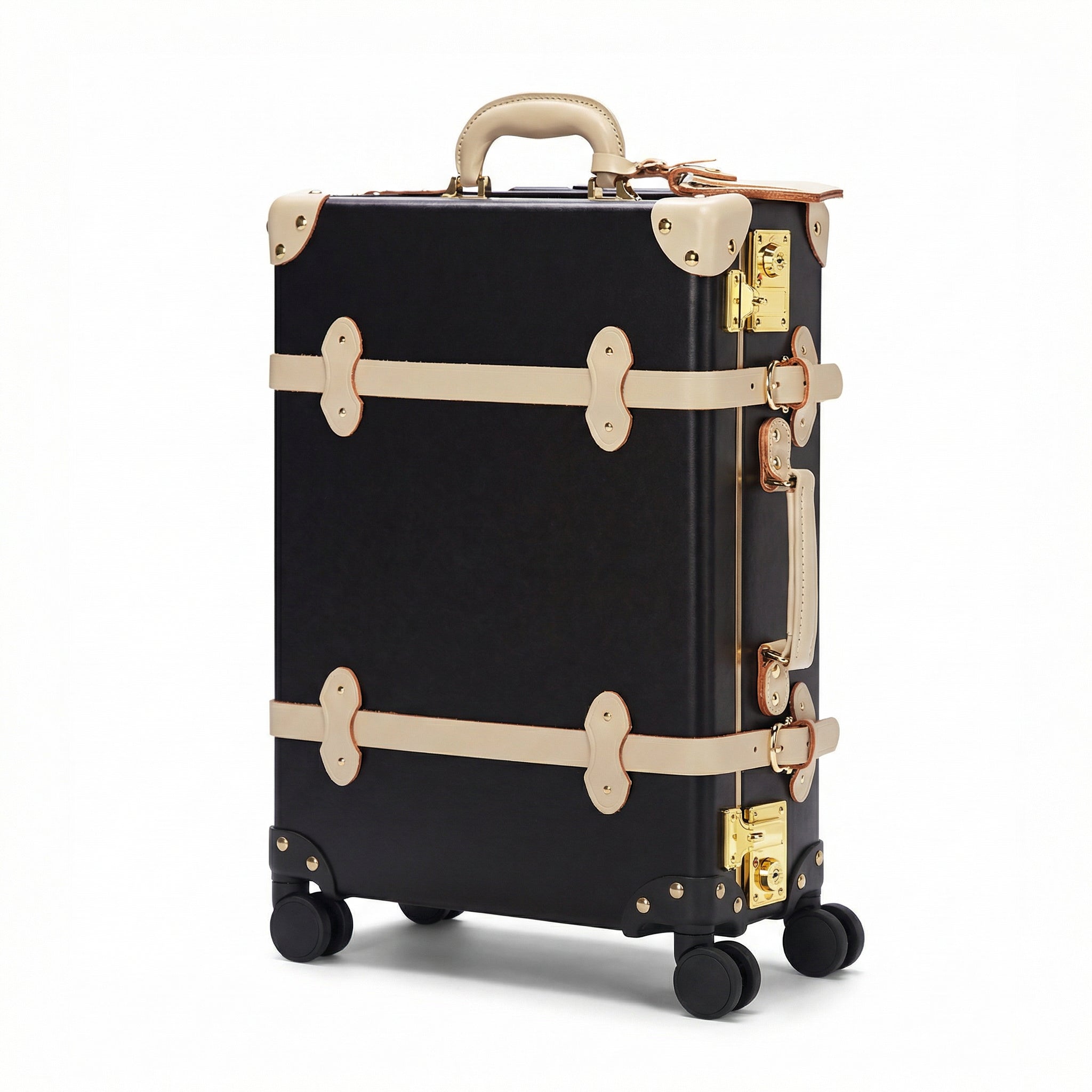 Black suitcase with gold accents on a white background