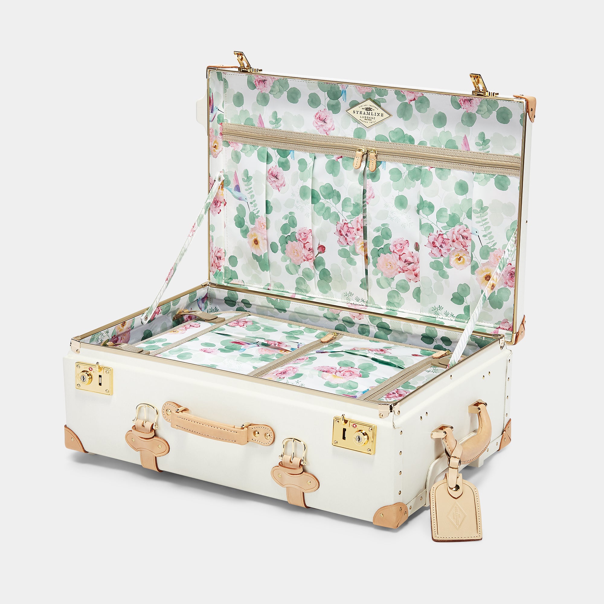 Floral-patterned suitcase with gold accents on a white background