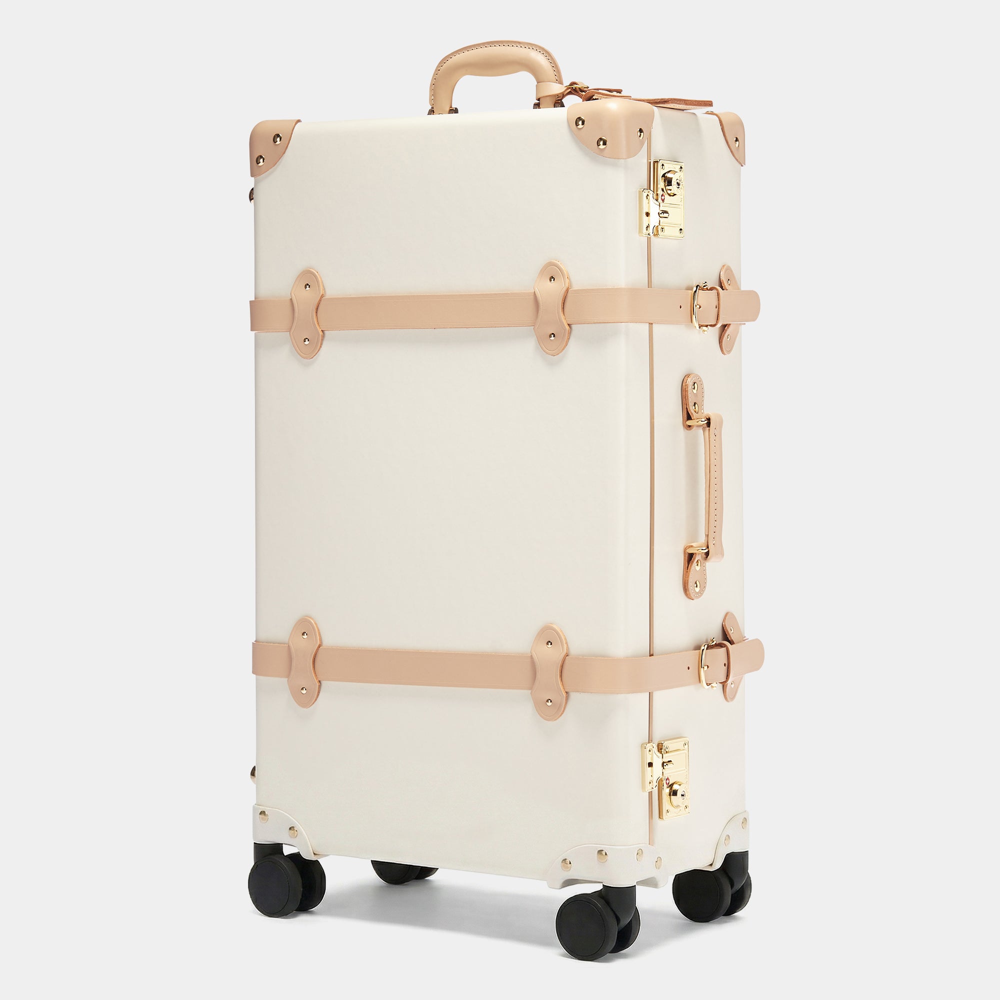 Beige suitcase with beige straps on a white background