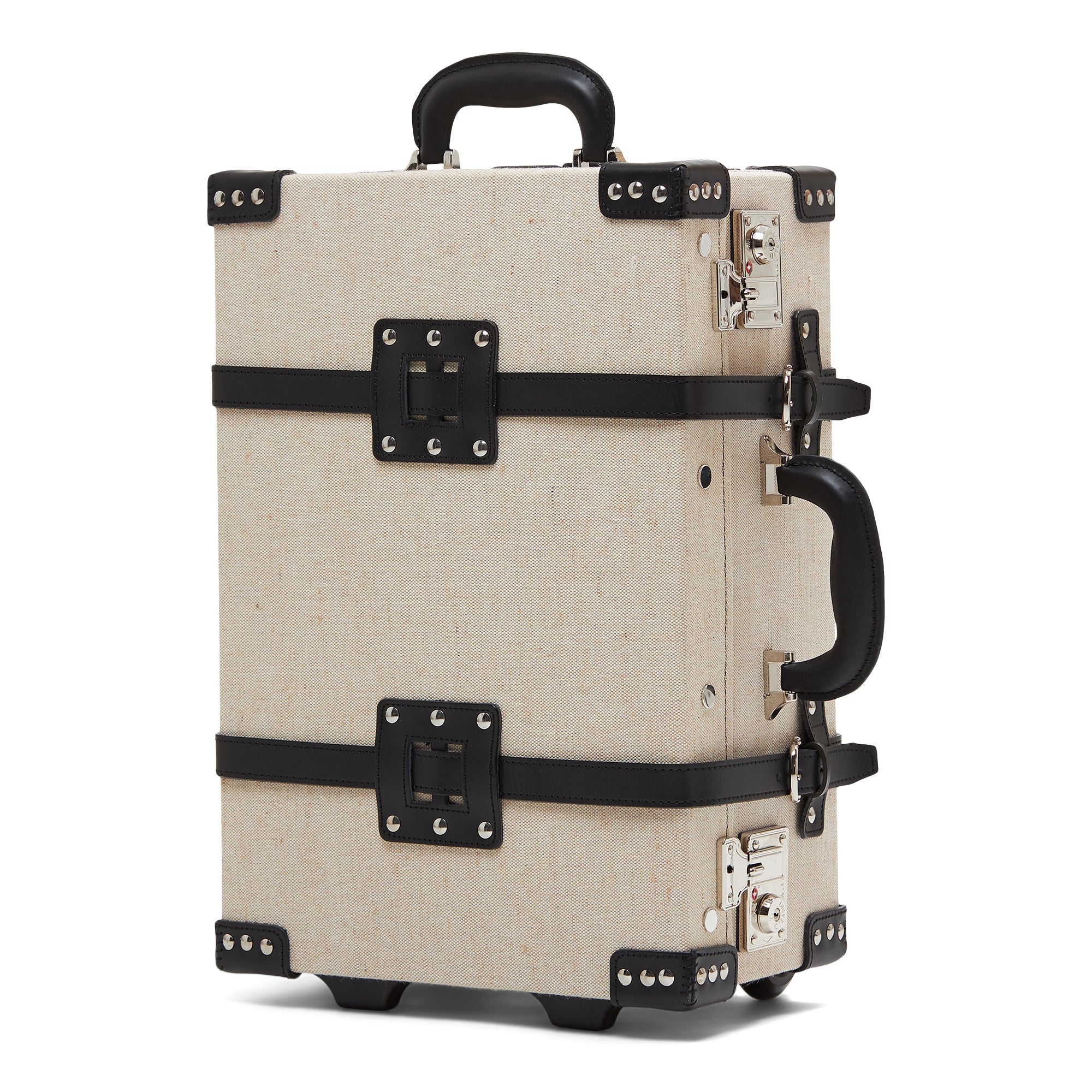 Beige suitcase with black straps and hardware on a white background