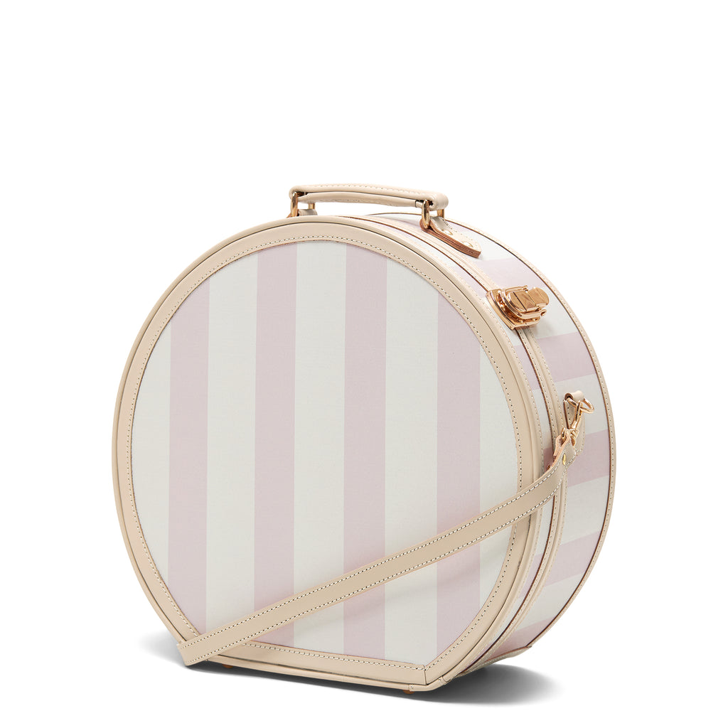 Round striped bag with a handle on a white background