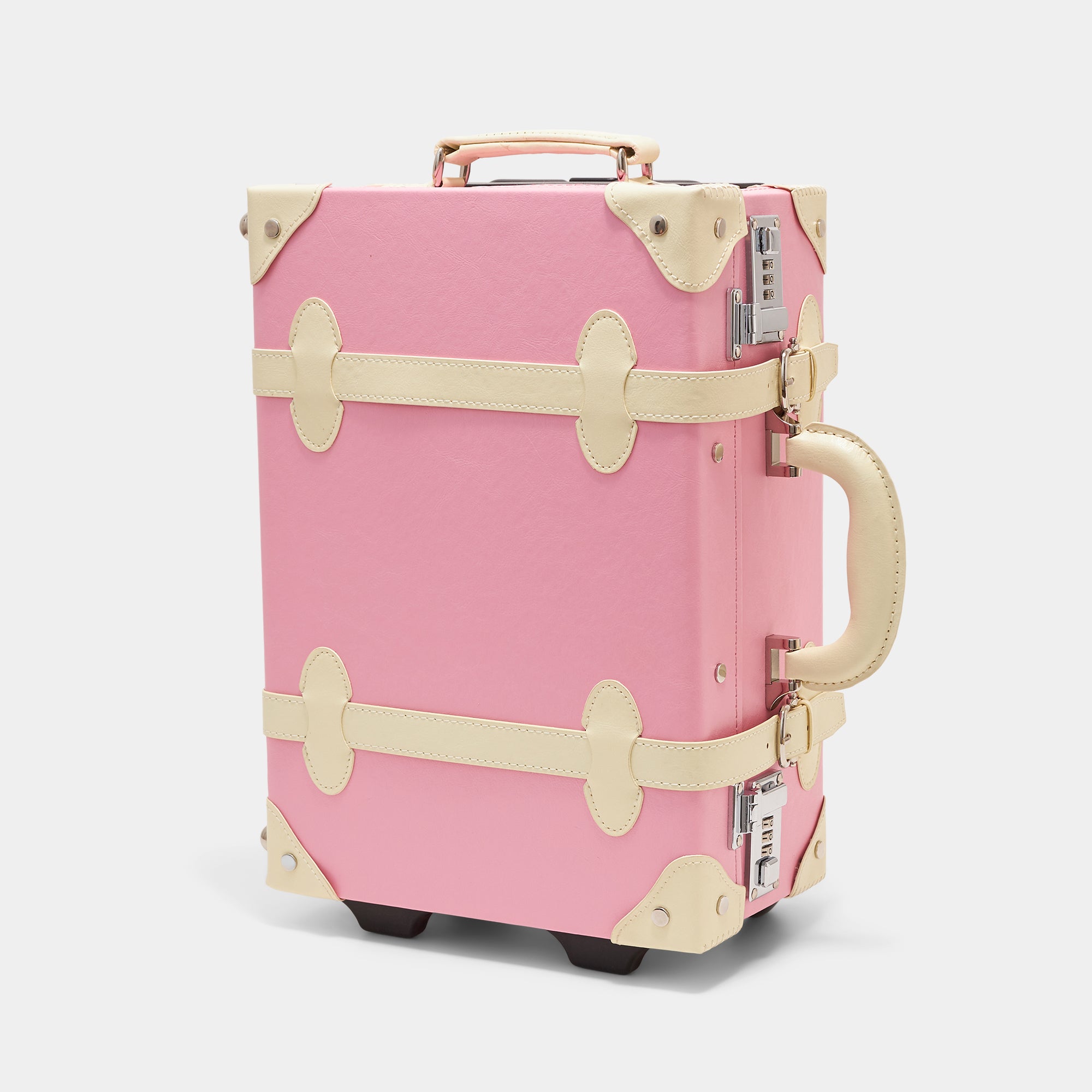 Pink suitcase with beige accents on a white background